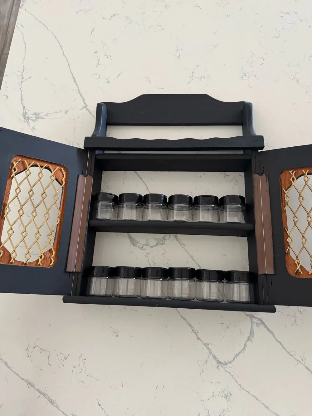 Black Wall-Mount Spice Cabinet with Gold Accent Door Grill